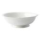 angled view of puro footed fruit bowl on a white background