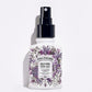 lavender vanilla spray bottle with a black lid on a white background
