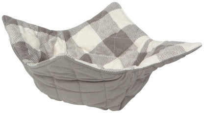 side view of the gray and white checked london gray bowl cozy on a white background