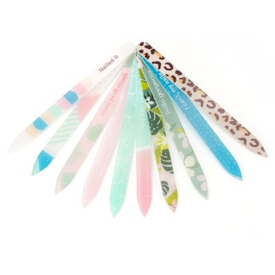 ten different glass nail files on a white background