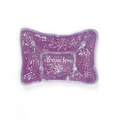 purple stress less spa pillow on a white background