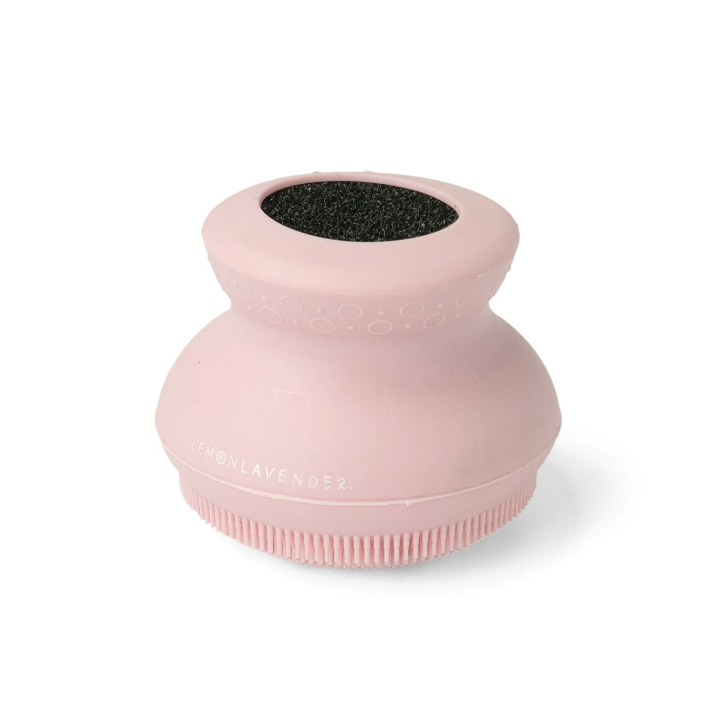 pink silicone body scrubber on a white background