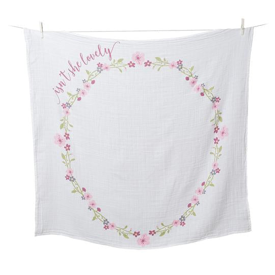 isn't she lovely baby's first year blanket hanging against a white background