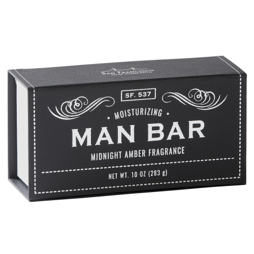 black rectangular box of soap on white background. box has "man bar" written in gold, swirling gold graphics above text, and gold dotted line bordering the box edges.