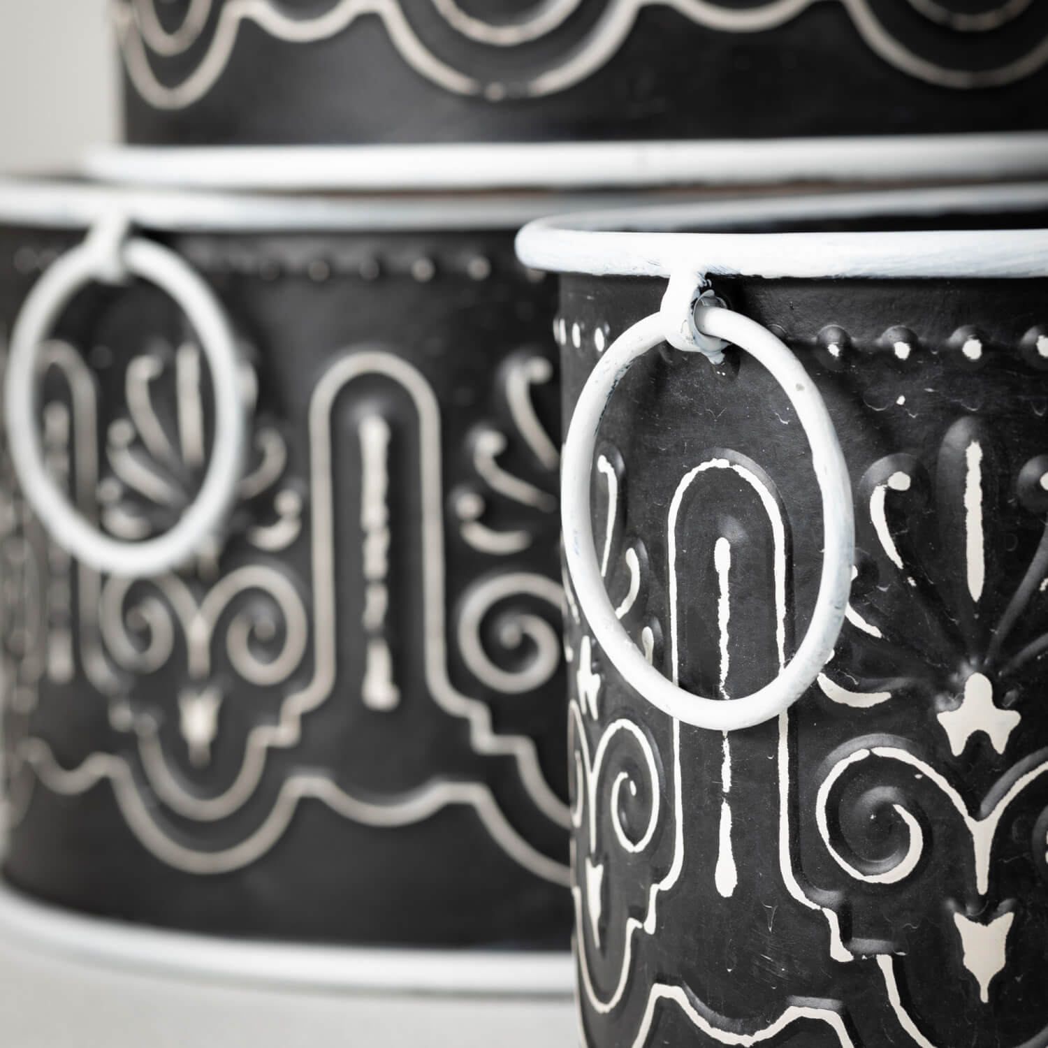 close-up of bucket design and ring handles.