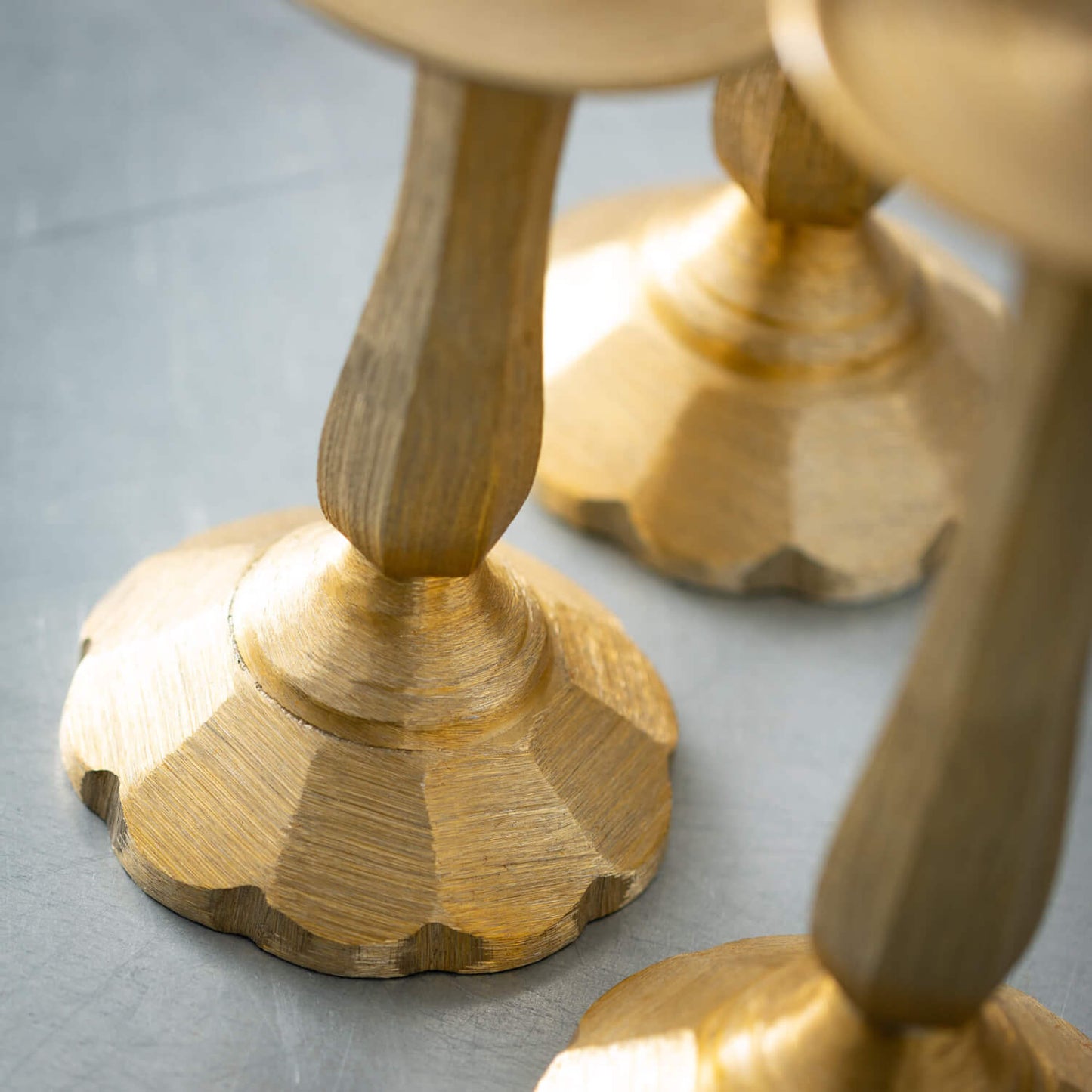 close up view of the bottom of the gilded classic pillar holders