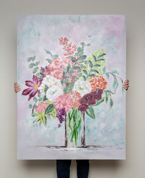 canvas with light background and vase of colorful flowers.