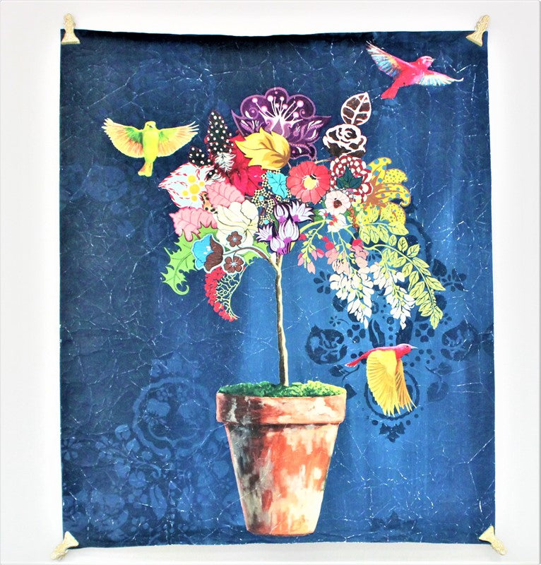 blue paper printed with topiary of colorful flowers in terracotta pot and red and yellow birds.