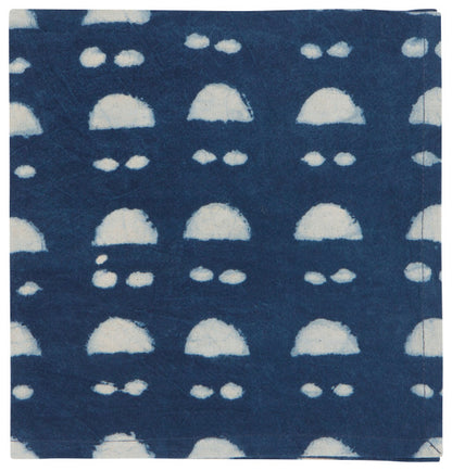 navy blue napkin with light blue cloud design.