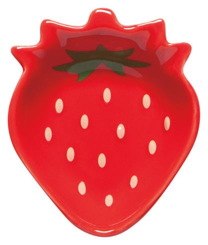 red strawberry shaped pinch bowl on a white background