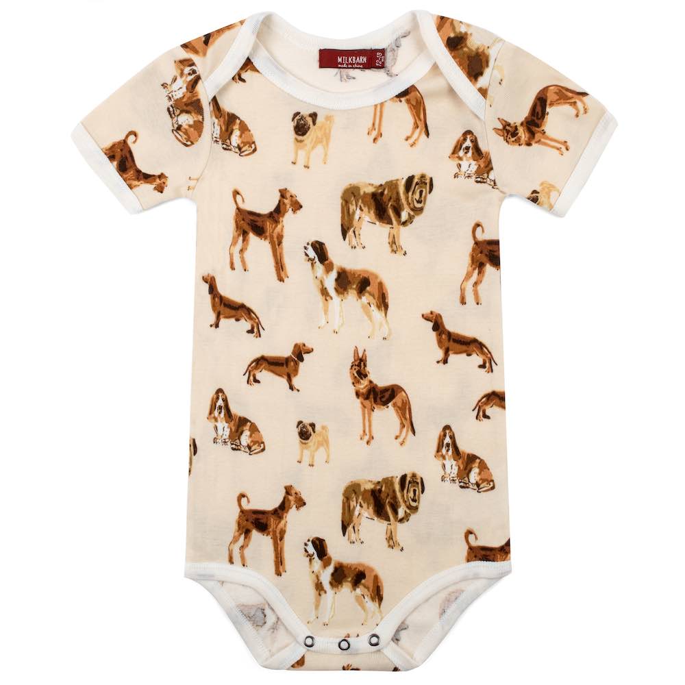 tan onsie with all-over dog pattern.
