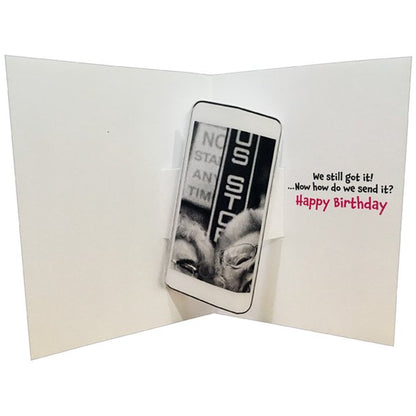 inside of card has a pop out picture of a cell phone and text listed in description