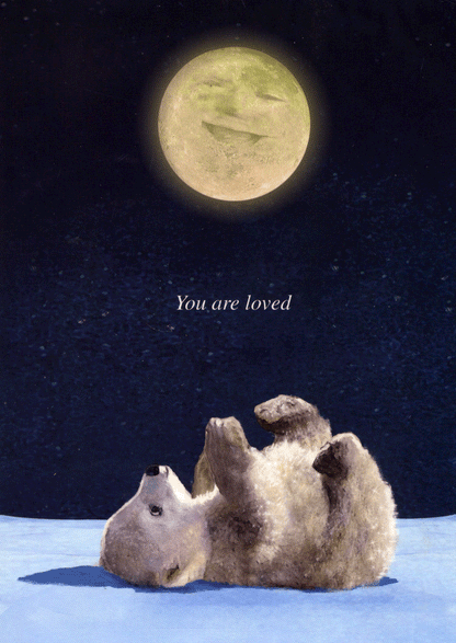 another page has a baby polar bear laying on it's back under a smiling moon