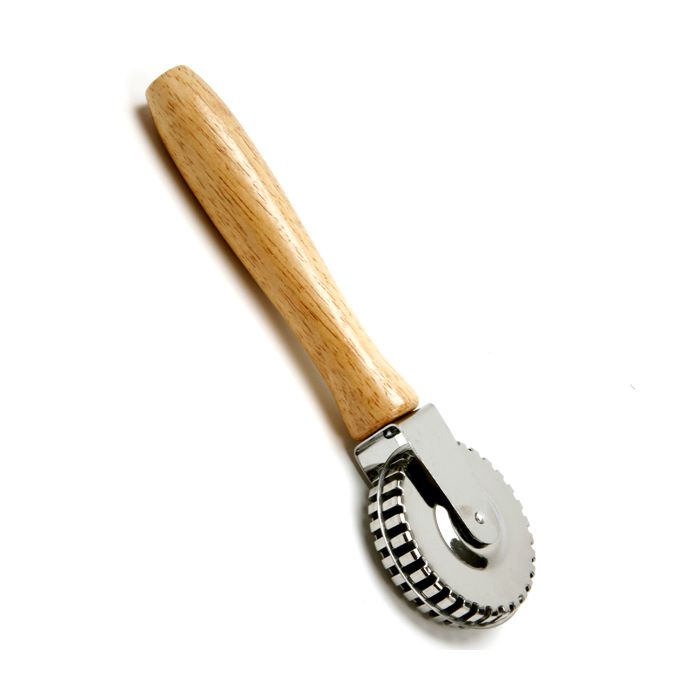 pastry crimper with wooden handle.