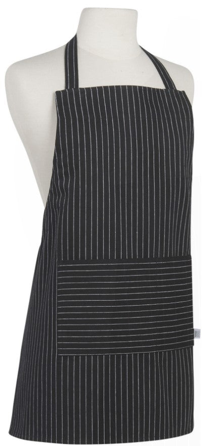 child's apron with black with white stripes on mannequin.
