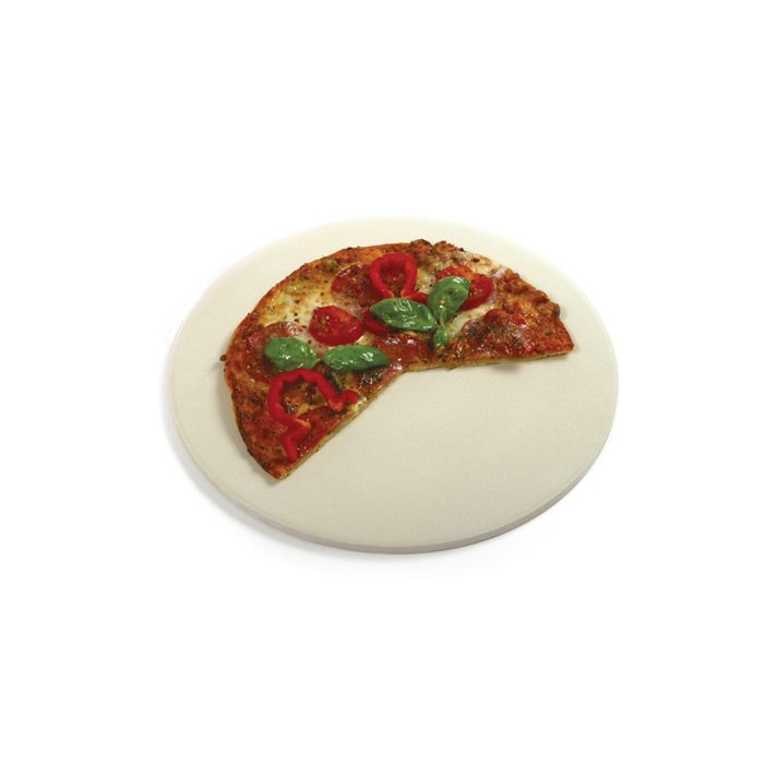 round pizza stone with partial pizza on it.
