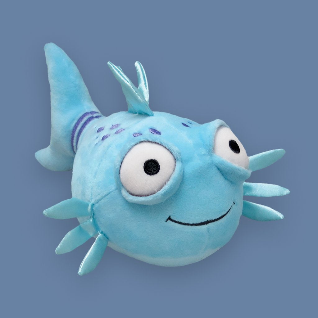 pout pout fish plush toy on a blue background