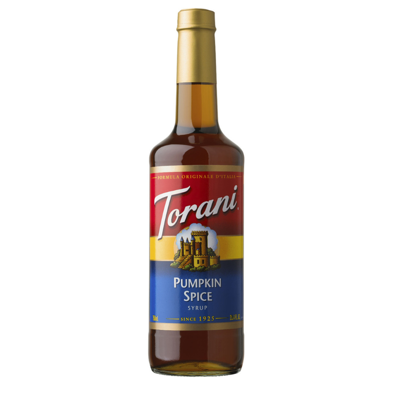 bottle of Torani Pumpkin Spice Syrup on white background.
