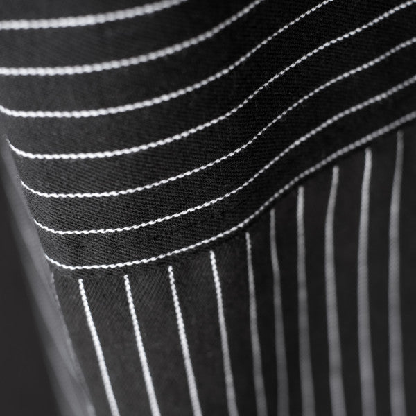 close-up of apron stripes.