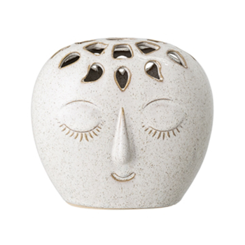 stoneware vase with meditative face displayed against a white background