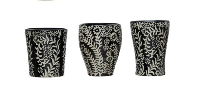 all three sizes of floral pattern stoneware cups displayed in a row on a white background