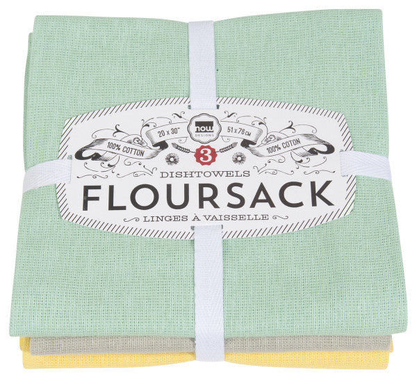 3 floursack towels folded and tied together with packaging.
