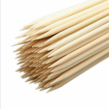 a bundle of 6 inch bamboo skewers on a white background