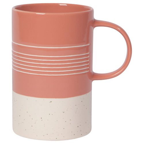 pink mug with exposed terracotta base and line pattern.