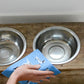 hand cleaning with dishcloth.