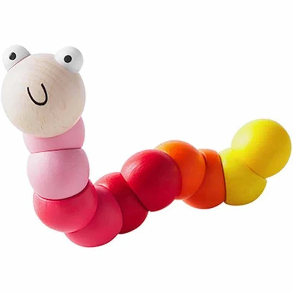 pink wiggle worm toy on a white background