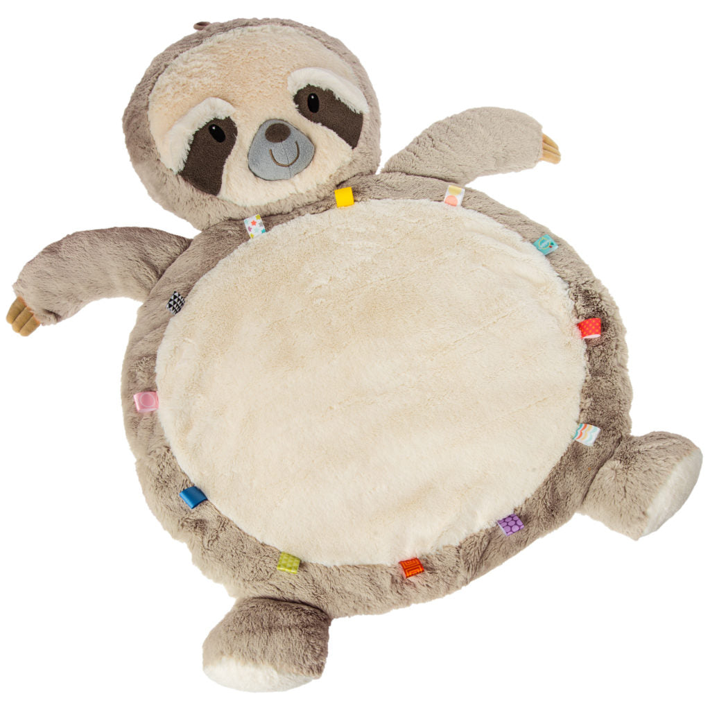 molasses sloth baby mat with multi colored tags all around the belly and displayed against a white background