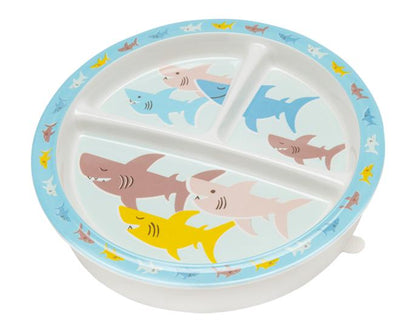 divided plate with colorful sharks on it and a blue rim.