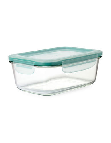 side view of glass container with lid.