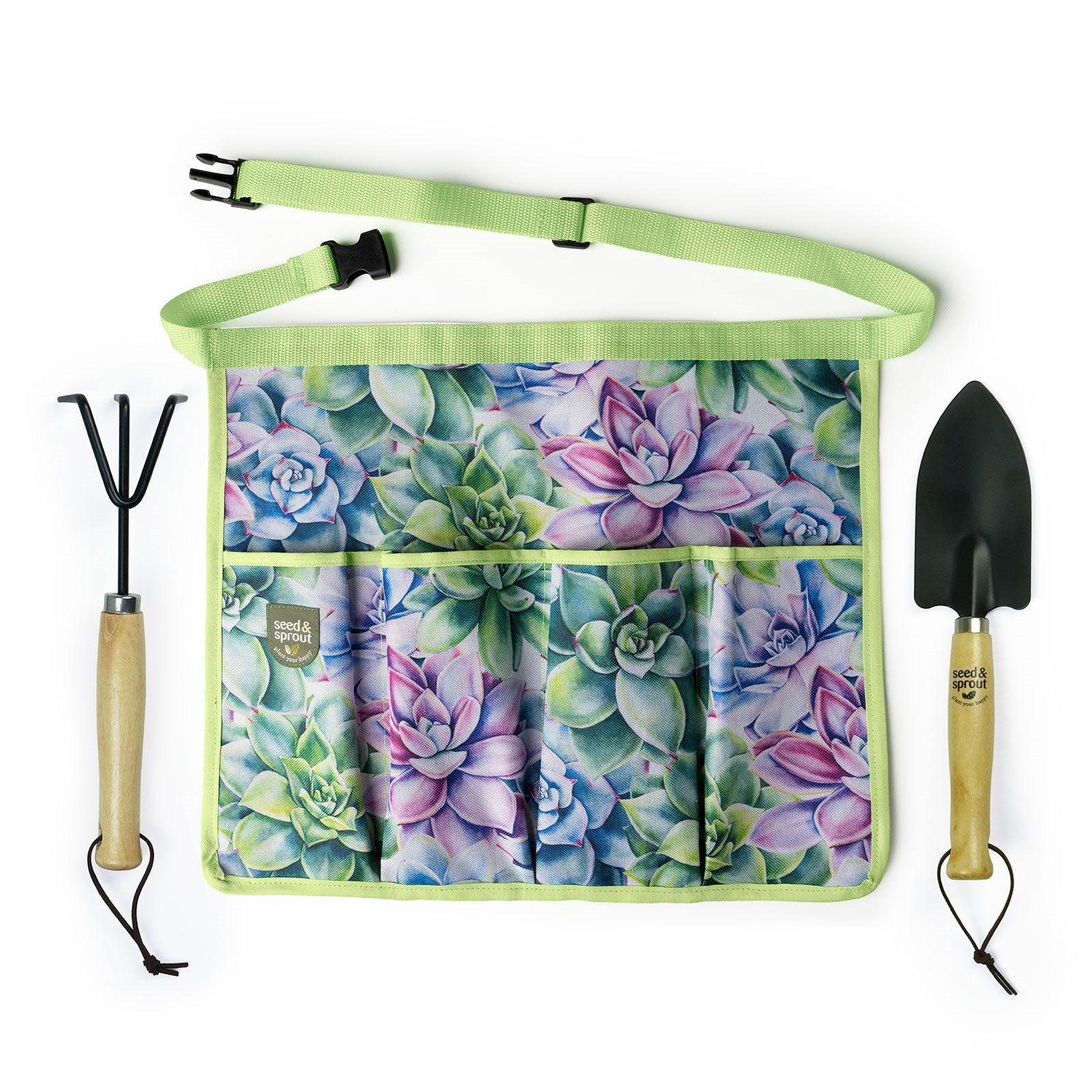 succulent printed  half apron with green trim and a hand shovel and rake set on each side.