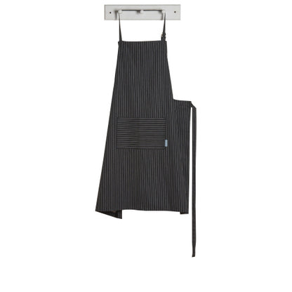 black apron with white stripes hanging on hook.