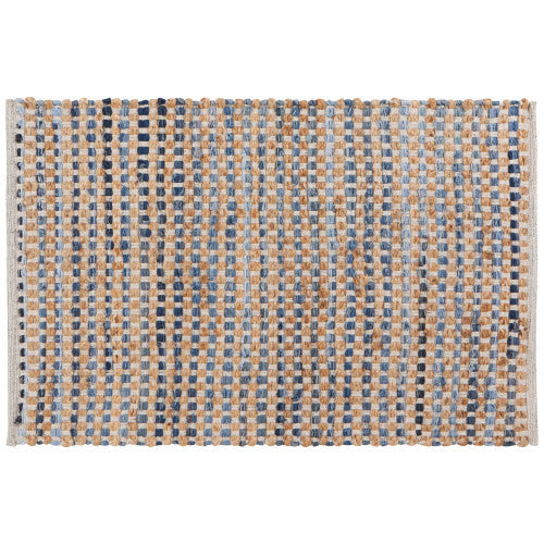 rug woven in various shades of blue and natural fibers.