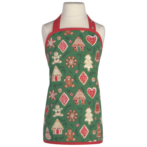 red and green christmas cookies child's apron displayed on a mannequin against a white background