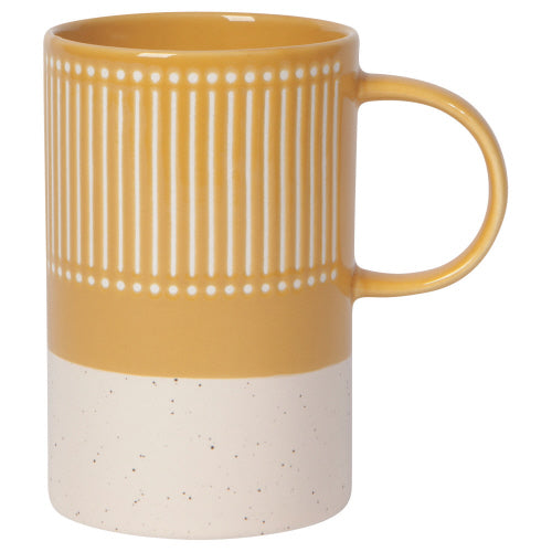 mustard yellow mug with exposed terracotta base and dot and line pattern.