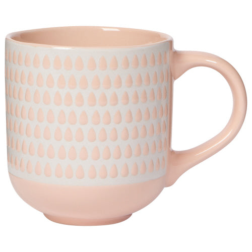 blush pink ceramic mug with cream pattern.