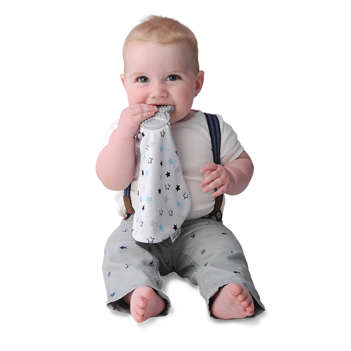 a little boy chewing on the twinkle twinkle munch it blanket against a white background