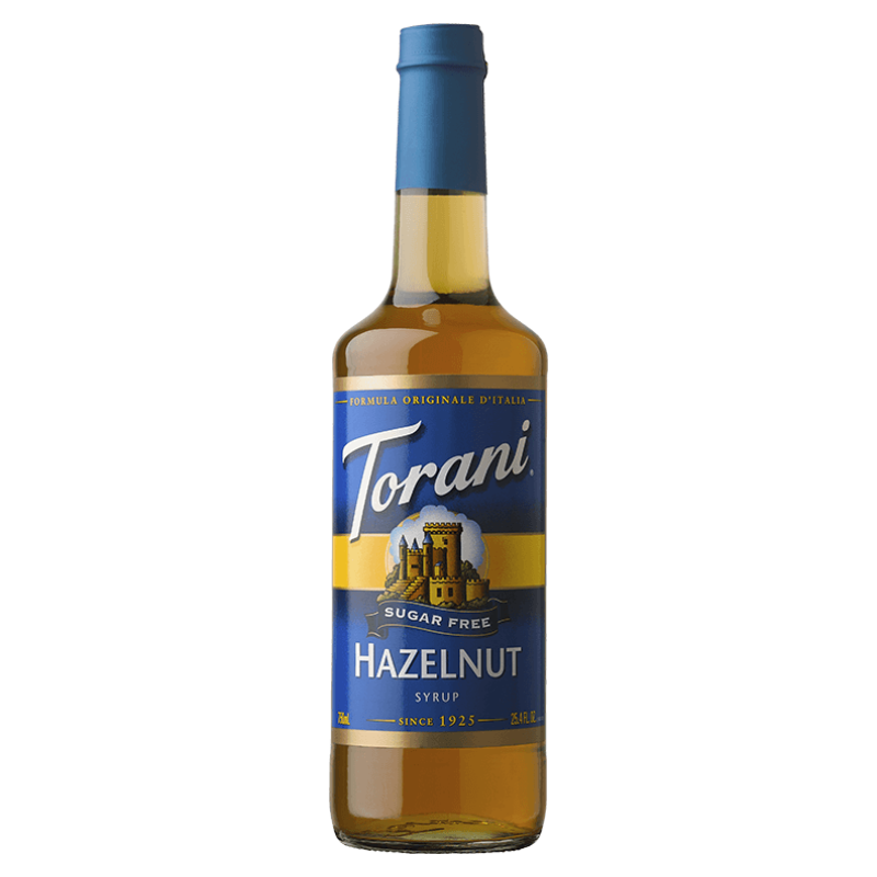 bottle of Torani Sugar Free Hazelnut Syrup on white background.