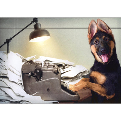 front of card has a german shephard sitting at a typewriter surrounded by a pile of mail