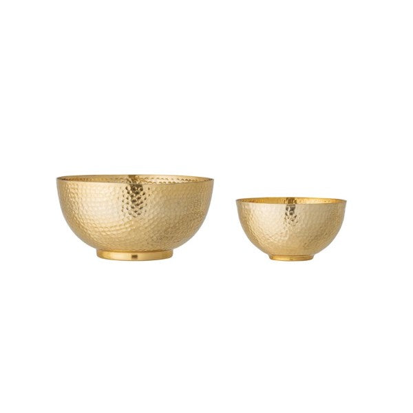 two hammered metal bowls on a white background