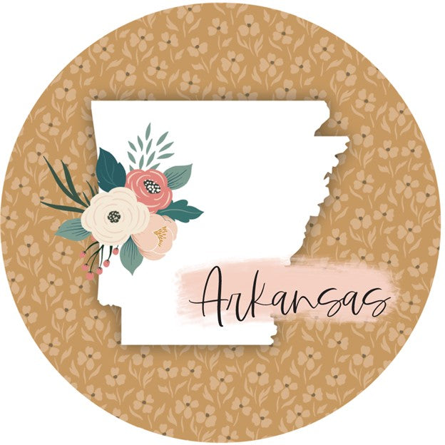 floral arkansas car coaster is tan with light tan tiny flowers all over and a large arkansas shape in white with a bundle of pastel flowers and the text arkansas in black and displayed on a white background