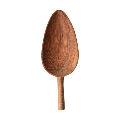 scoop doussie wood utensil on a white background