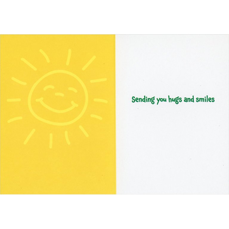 left inside view of card is yellow with a smiling sun and right side is white with green text