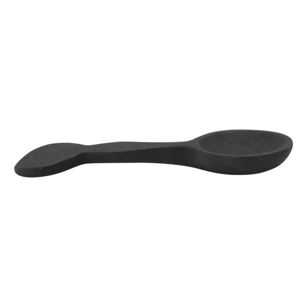 side view of round acacia wood spoon on a white background