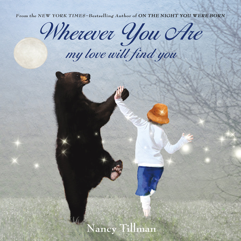 front cover of book has illustration of a boy and a bear dancing in a field surrounded by fireflies, title of book in navy, and author's name