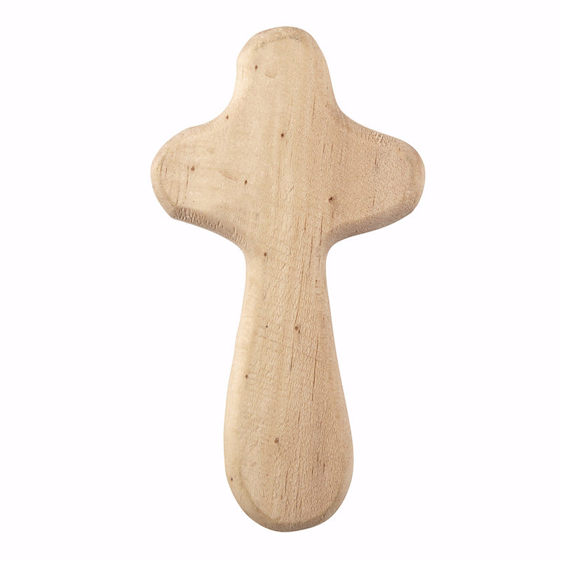 natural hand held wooden cross on a white background