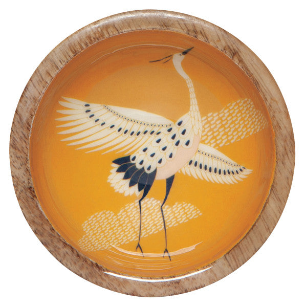 mini yellow bowl with crane and clouds design inside.
